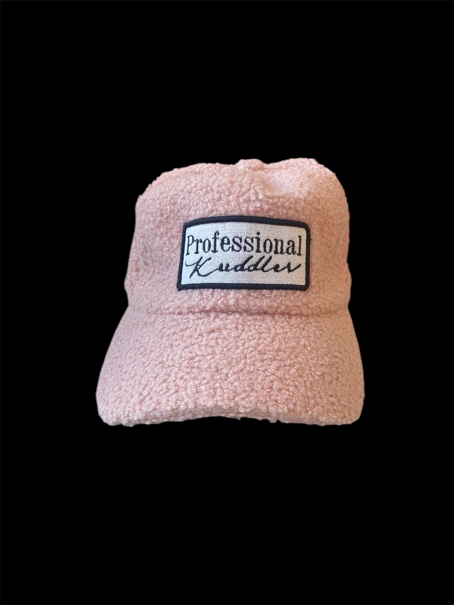 “Professional Kuddler” patch fuzzy 5 panel trucker hat.
